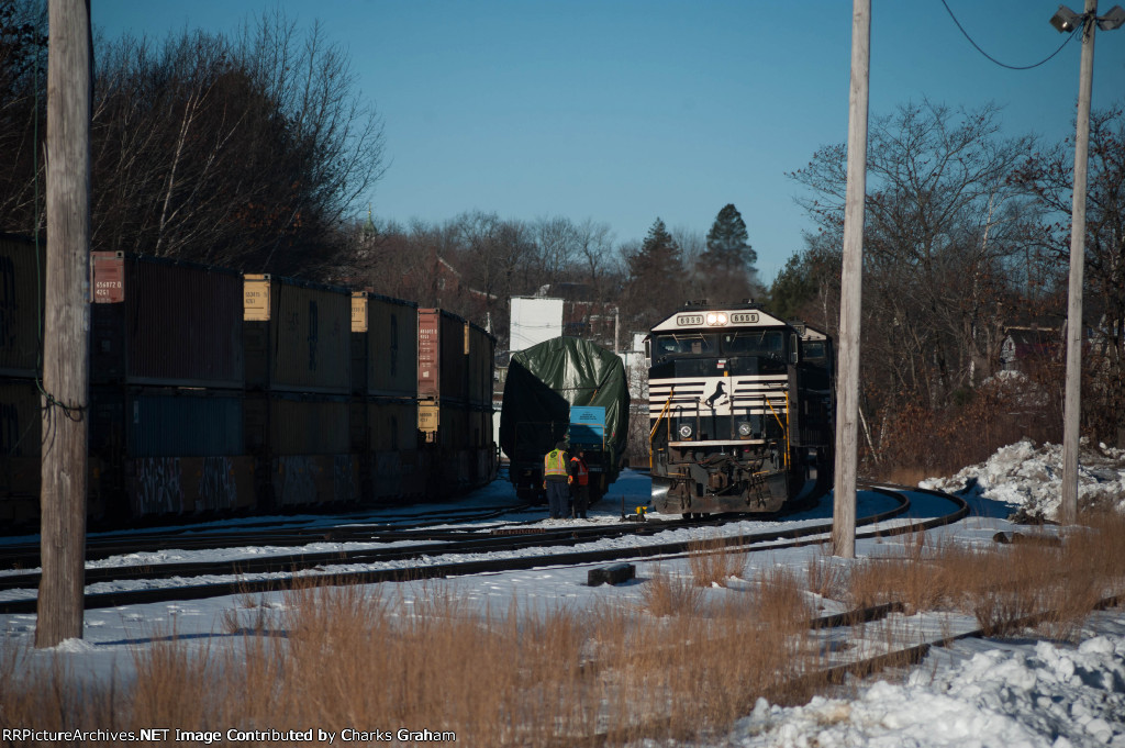 NS 6959 and crew next to the mysterious DOD flatcar